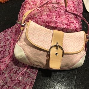 Coach Shoulder bag and pink and white.